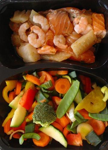Wok with vegetables and fish